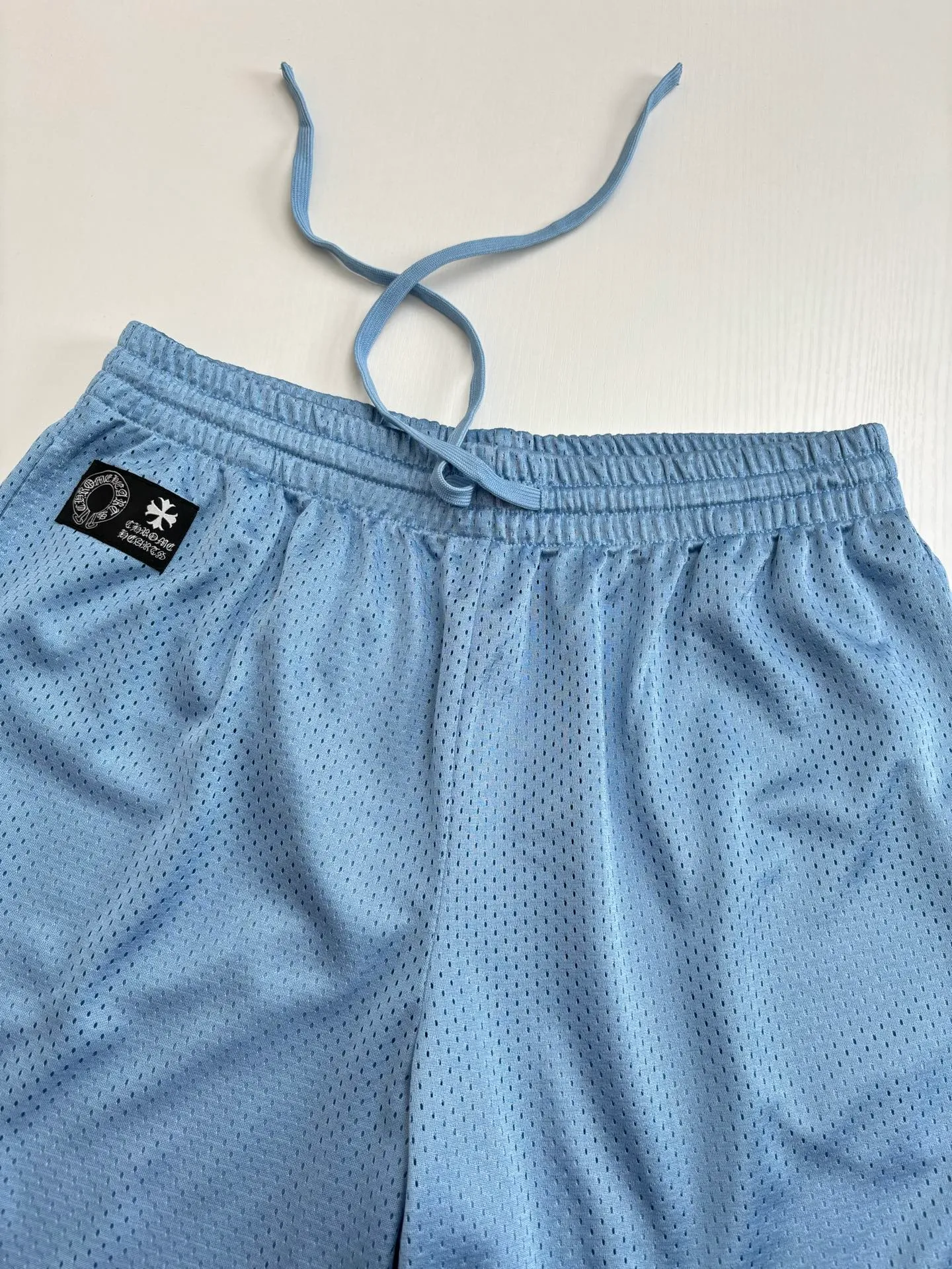🅿️290 Chrom Heart*/Ch 25SS mesh glitter blue ice hockey shorts. The fabric is made of high-density 100D bird's eye cloth. Double-sided mesh positioning is very time-consuming. The cost of labor loss is very high. It is not a single-layer thin transparent bottom junk product on the market. Same style for men and women. OS size: S/M/L